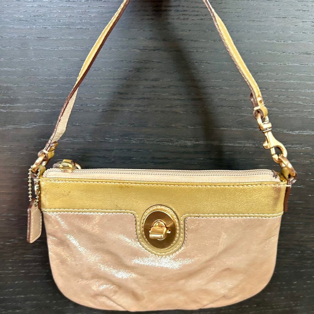 Coach Peyton Metallic wristlet, leather with hang tag